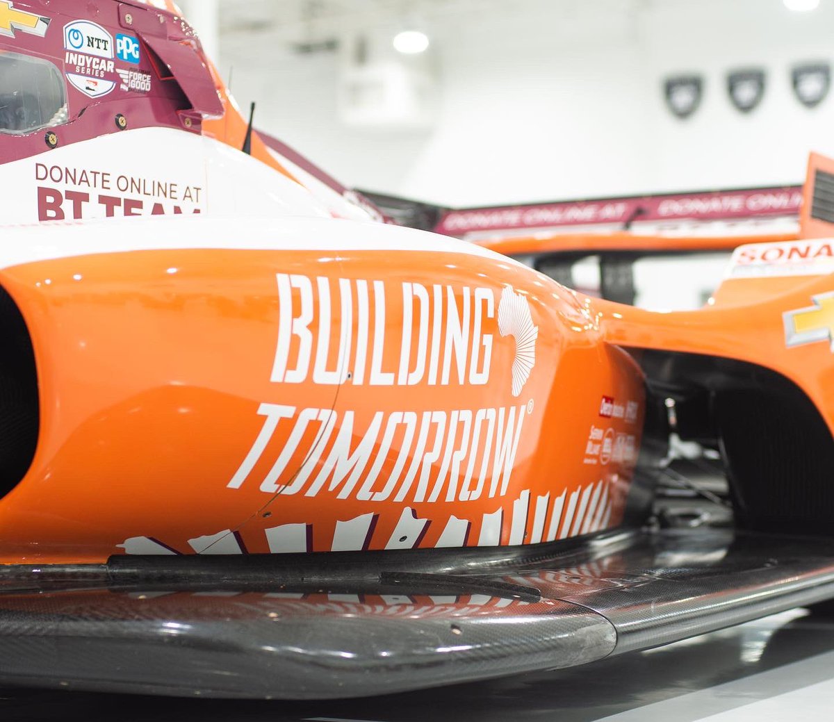 ECRIndy's tweet photo. Meet the No. 21 @bldgtomorrow Chevrolet for this weekend’s #INDYGP!
Hundreds will #RideWithRinus at @IMS & nearly 4,000 Ugandan school children will be enrolled in Building Tomorrow’s programs - some going back to school for the first time in two years! 🧡 https://t.co/Wt8q5PfzFZ