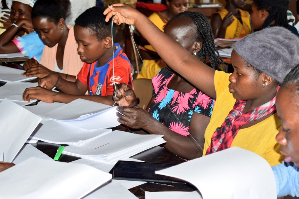 burgess_fdtn's tweet photo. Happening Now; Mr.Ssetimba Moses is committed to leaving no one behind on how to bind a black book on this #BeHandsOn skill workshop. https://t.co/d7x2MvK1TY