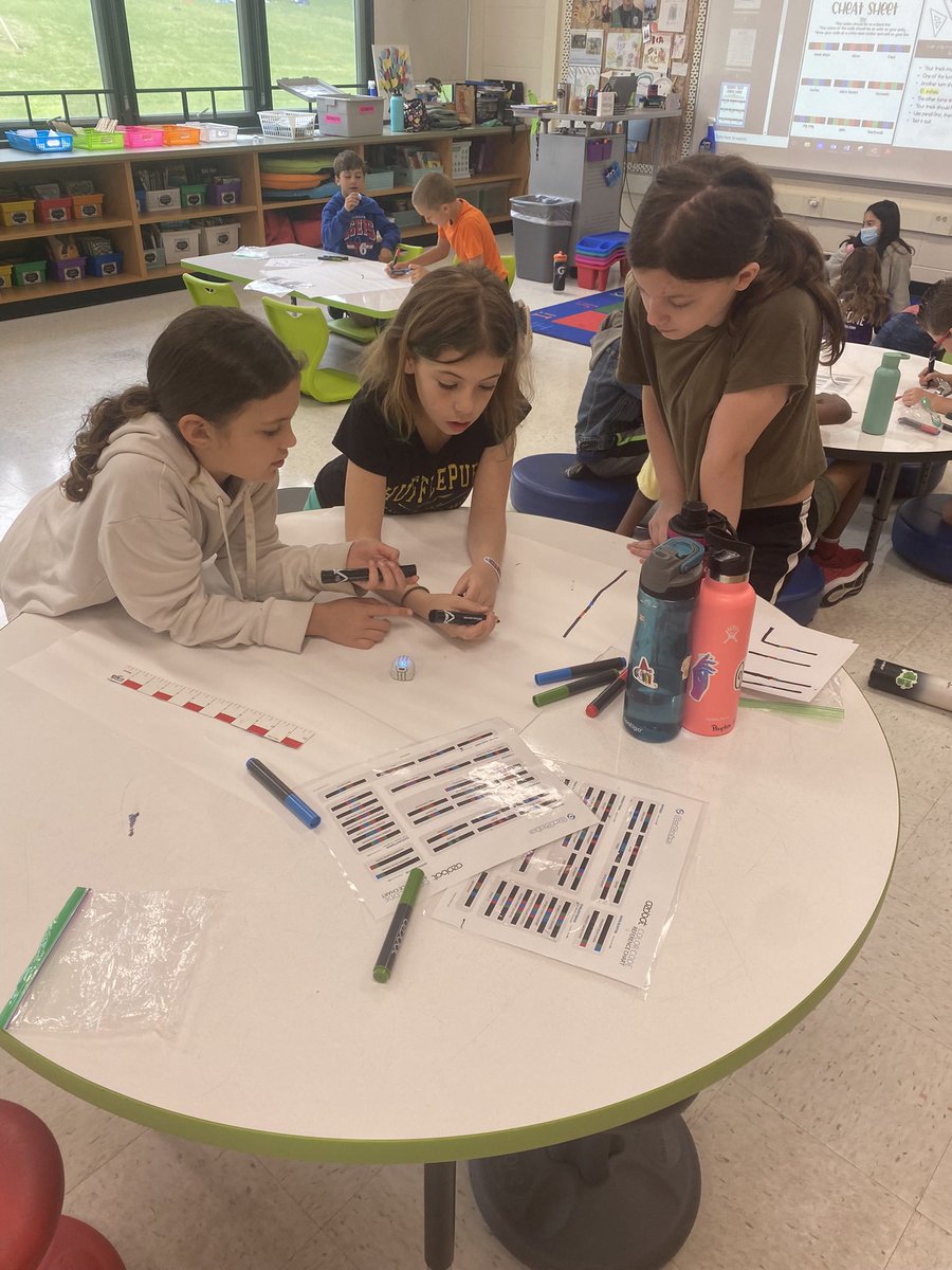 Incorporating STEM into our math block on measurement! Students loved coding with the Ozobots! 🤖