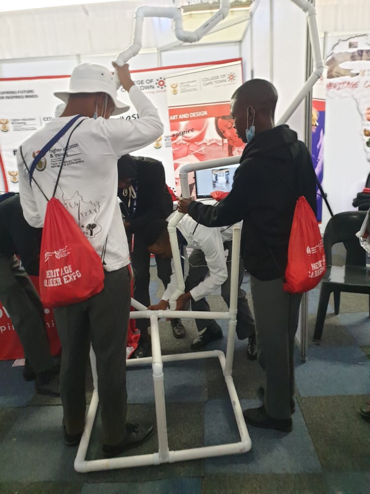 CollegeofCT's tweet photo. Competition time : Students attending the Heritage Careers Expo at  NCU TVET College  competing to assemble the  pipe that is shaped as the African Continent , Which was initially built by the College of Cape Town Plumbing Students.
@CapeTvet https://t.co/Le6B2rtYRt