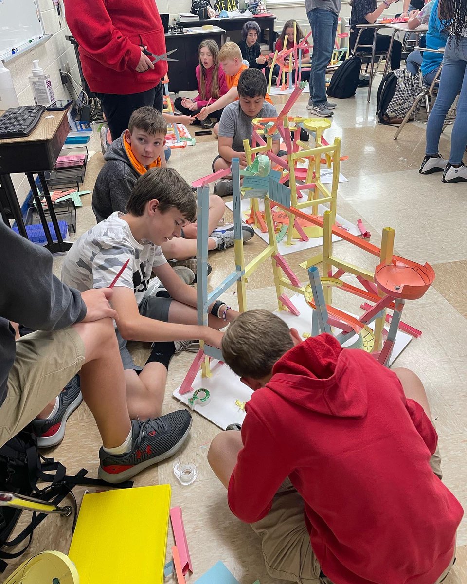 OcoeeMiddle1's tweet photo. Check out these 6th graders constructing paper roller coasters to explain the relationship between kinetic energy and the mass of an object in motion and it’s speed! #LeadtheCharge https://t.co/SM42FxfGrB