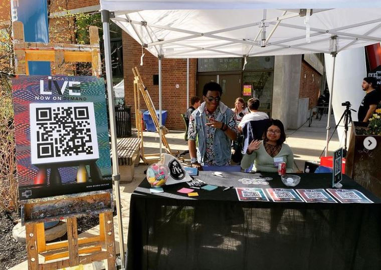 OCAD's tweet photo. Meet OCAD U LiVE (#OCADU’s student TV channel) creators and watch live tapings of PODCAD today in Butterfield Park! https://t.co/3LUiARYIrY #GradEx107 https://t.co/VjL1GuUmsZ