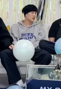 jooheon's black hair and his Born Champs hoodie <3