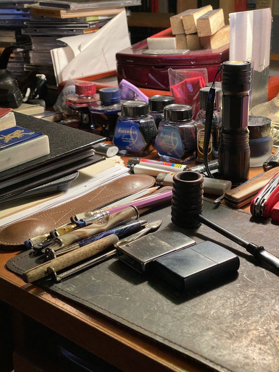 Peter’s groaning desk.