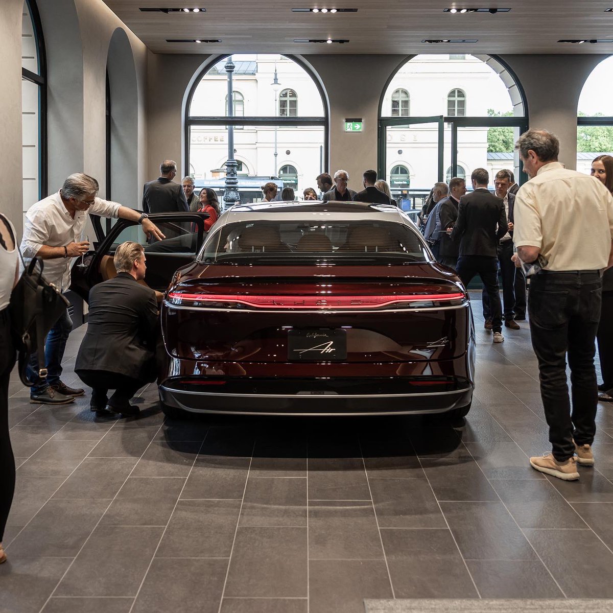 LucidMotors's tweet photo. We’ve officially landed in Europe. We’re proud to be sharing the most-efficient, longest-range #EV with the world, right here in Munich, Germany. #LucidAir #DreamAhead https://t.co/5XKpvHuAur