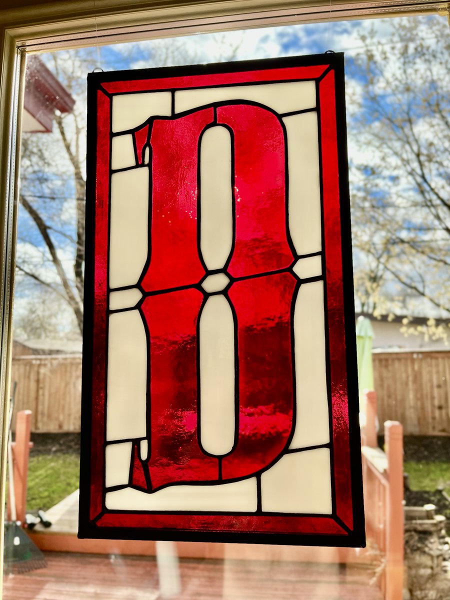 Devolver Digital logo made out of Stained Glass