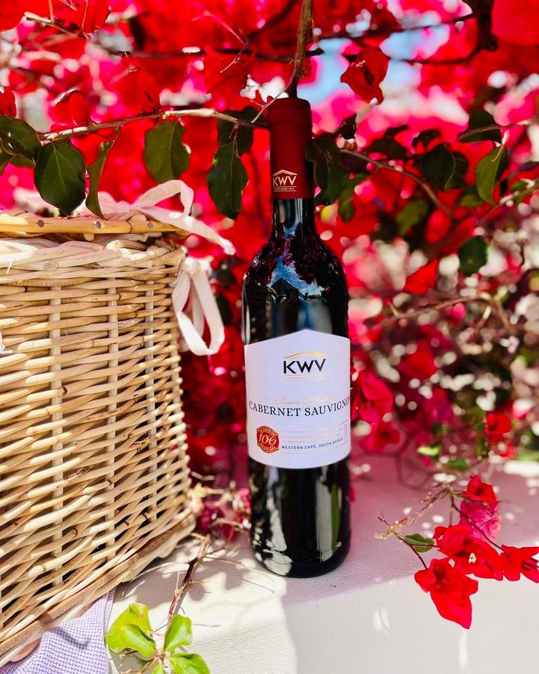 WOSACanada's tweet photo. "Happiness in a nutshell: fresh flowers, sunshine and the KWV Classic Collection Cabernet Sauvignon." @KWVwines #KWVWines #KWVClassicCollection #WOSA https://t.co/OiDhtZrEOa