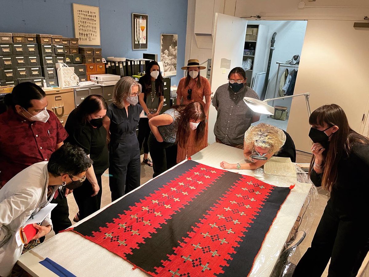 MIACSantaFe's tweet photo. Thursday May 12th, MIAC hosted fellows and staff from the Lunder Institute for American Art at Colby College: Pictured here are Horizons co-curators Hadley Jensen and Rapheal Begay (Dine), sharing information about the connections between photography, weaving, and landscape. https://t.co/GzCflbTrD4
