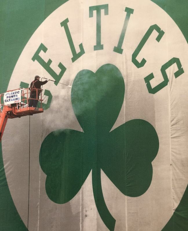atlanticpowerco's tweet photo. Flashback Friday - Atlantic cleaning the old Celtics Banner next to 93 (Charlestown). #bostonceltics #bostonbruins #bostonsports #johnnymost https://t.co/quFphlHxtP