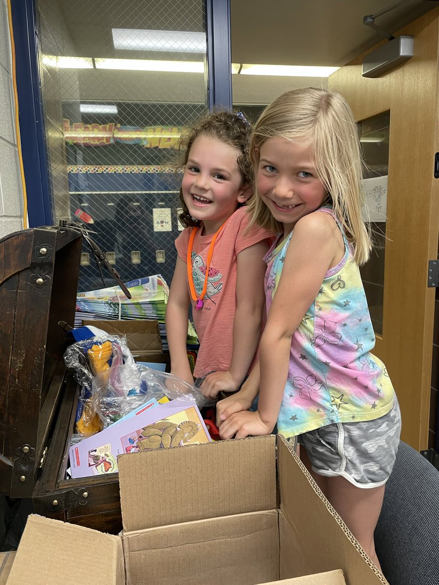 MeghanWay's tweet photo. How cute are these two! Digging for treasure in the PBIS treasure chest! https://t.co/aZuLM5N5FR