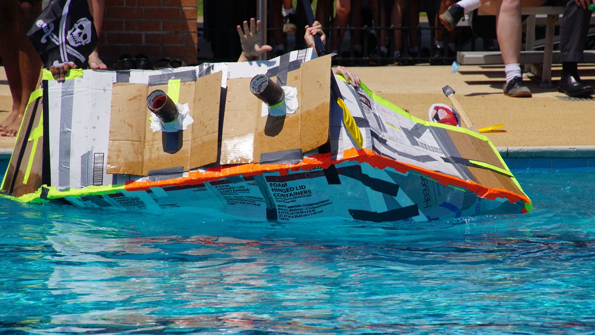 UMSWright's tweet photo. To complete their unit on Fluid Mechanics, Mrs. Cullen's Honors Physics classes had to design and construct a boat that would float 2 students from one side of Lubel Pool to the other. The catch...they could only use cardboard boxes and duct tape! #clearpathforpotential https://t.co/l01Aw9SrsM