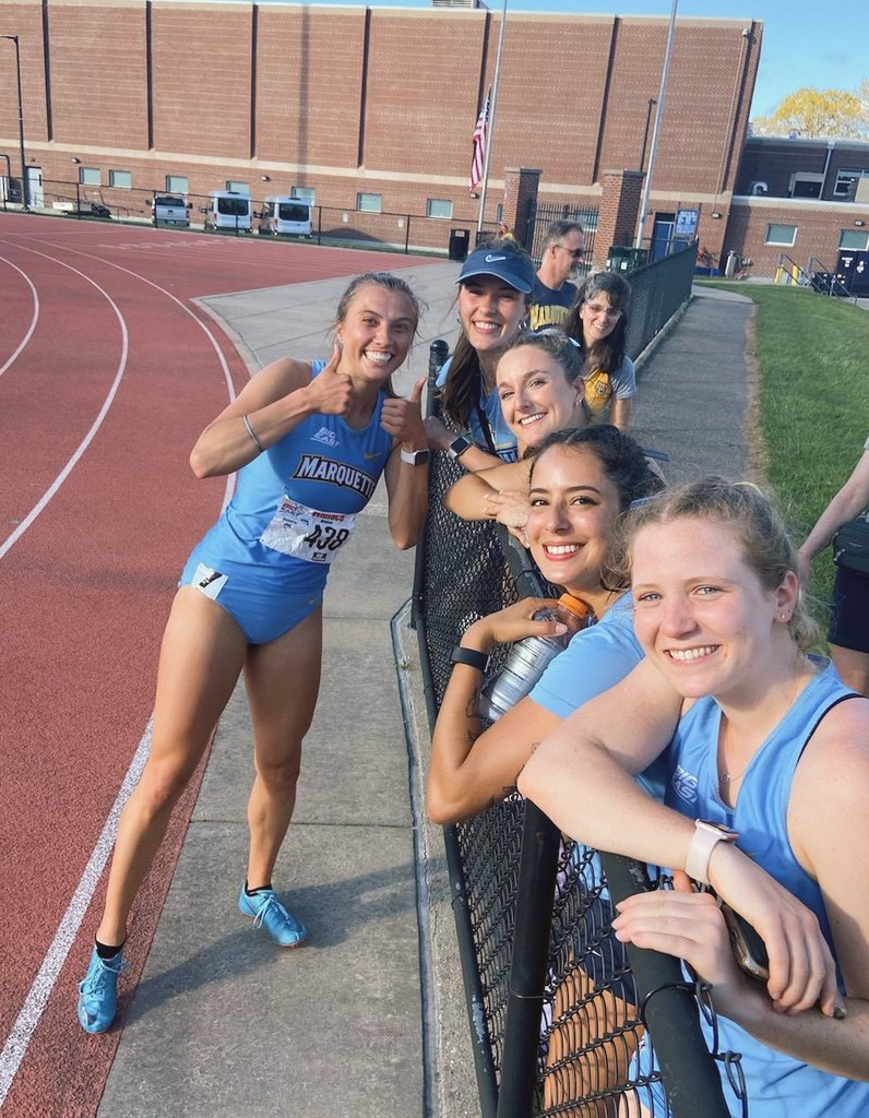 After a mixup earlier in the meet, Senior Megan Wallace had to re-run her heat of the Heptathlon 200m. The team lined the track and cheered LOUDLY to give her a boost after a tough day 1 of competition. The result: an almost 1/2 second PR! #wearemarquette #gotafterit