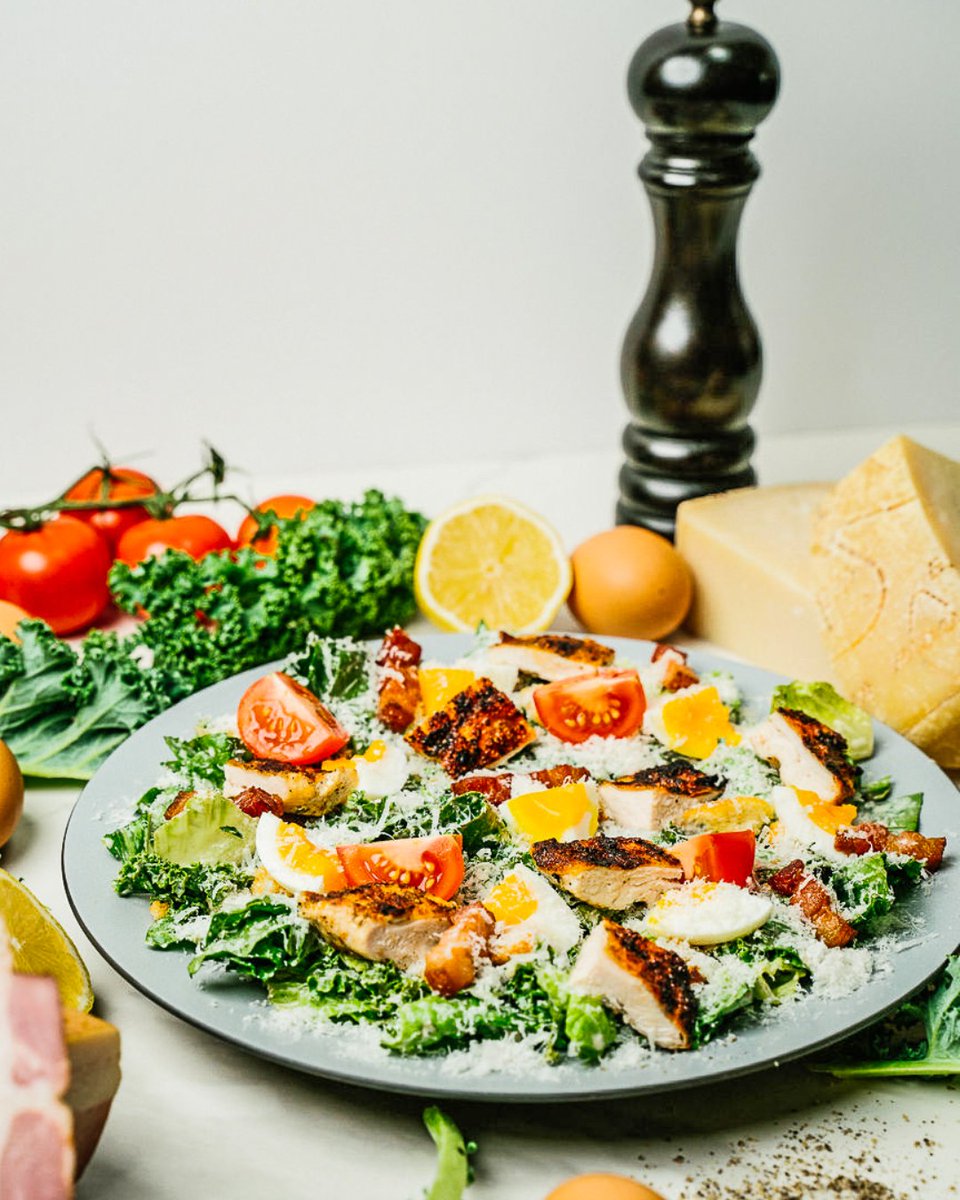 Not your average cobb salad. 'The New Cobb' is a delightful mix of kale and romaine lettuce, dressed in grana padano dressing, soft-boiled egg, grilled chicken breast and double-smoked bacon. Only available in select locations. #JOEYRestaurants #salad