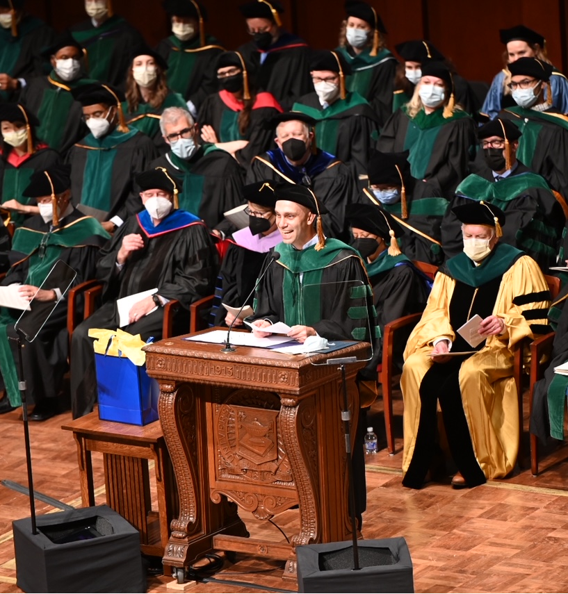 UMichMedSchool's tweet photo. Dr. Adam Baruch giving heartfelt remarks after receiving the Senior Year Award. This award is given to a faculty member chosen by the graduating class. The recipient embodies the ideals of medical education. #GoBlueMD https://t.co/hOuNVinYNC