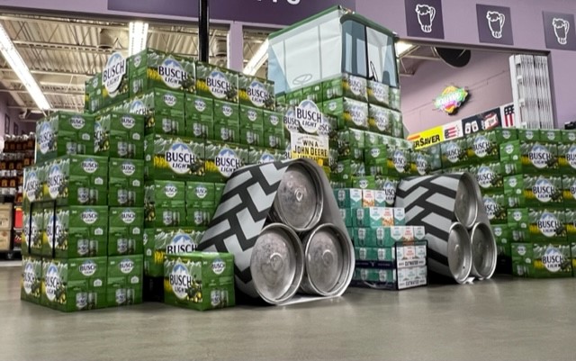nebraska_qb's tweet photo. Make sure to stock up on @BuschBeer  X @JohnDeere  cans for the weekend! 🌽🌽
Shout out to Justin White and Matt Sabata for this amazing display. 🙌 https://t.co/tooStPrL2m