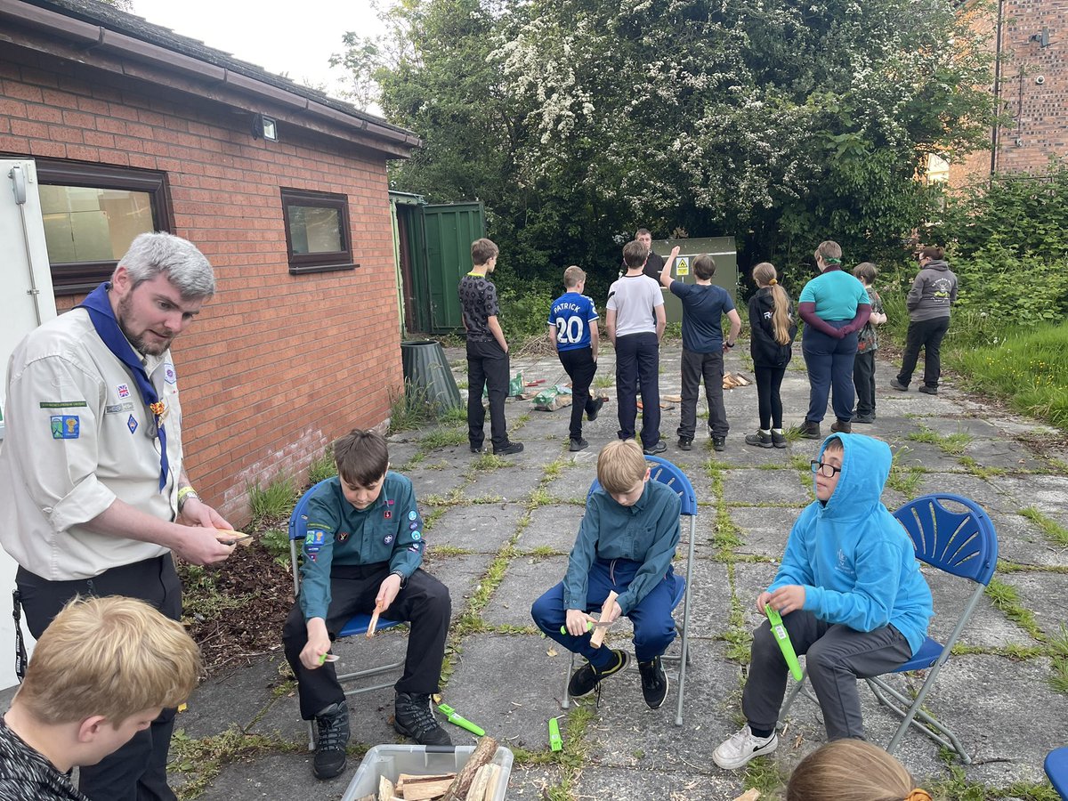 Scouts out doing knife axe and saw earning there permits so they can use them on camps!