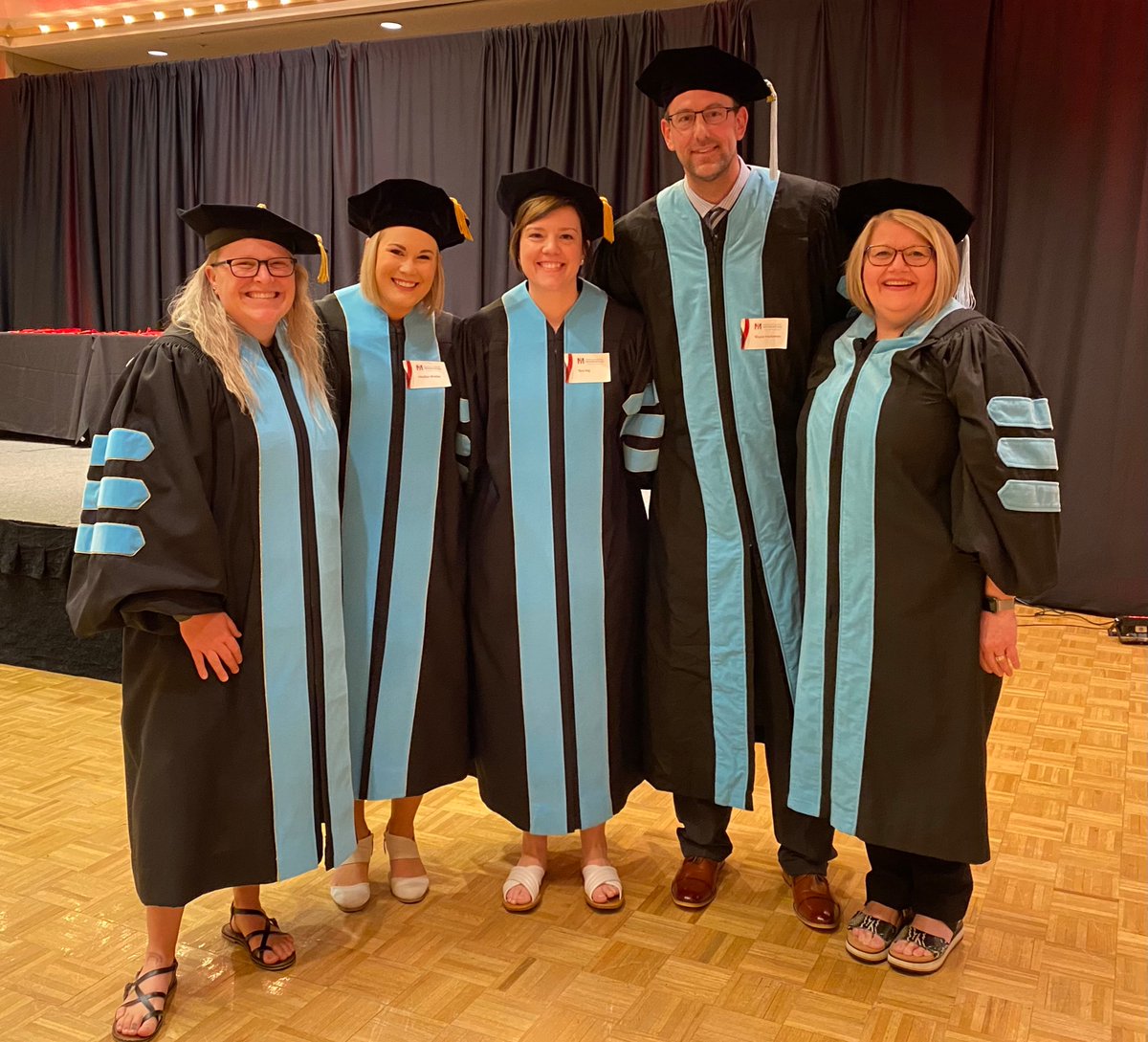 🖤❤️ Members of Cohort 3 Educational Leadership Doctoral Program, gathering before the graduation ceremony. It was fantastic to see you all together!!! 💐 #DragonFamily <a href="/MSUMGradStudies/">MSUM Grad Studies</a> Dr. Megan Johnson gave a remarkable speech! 🎤🔥❤️