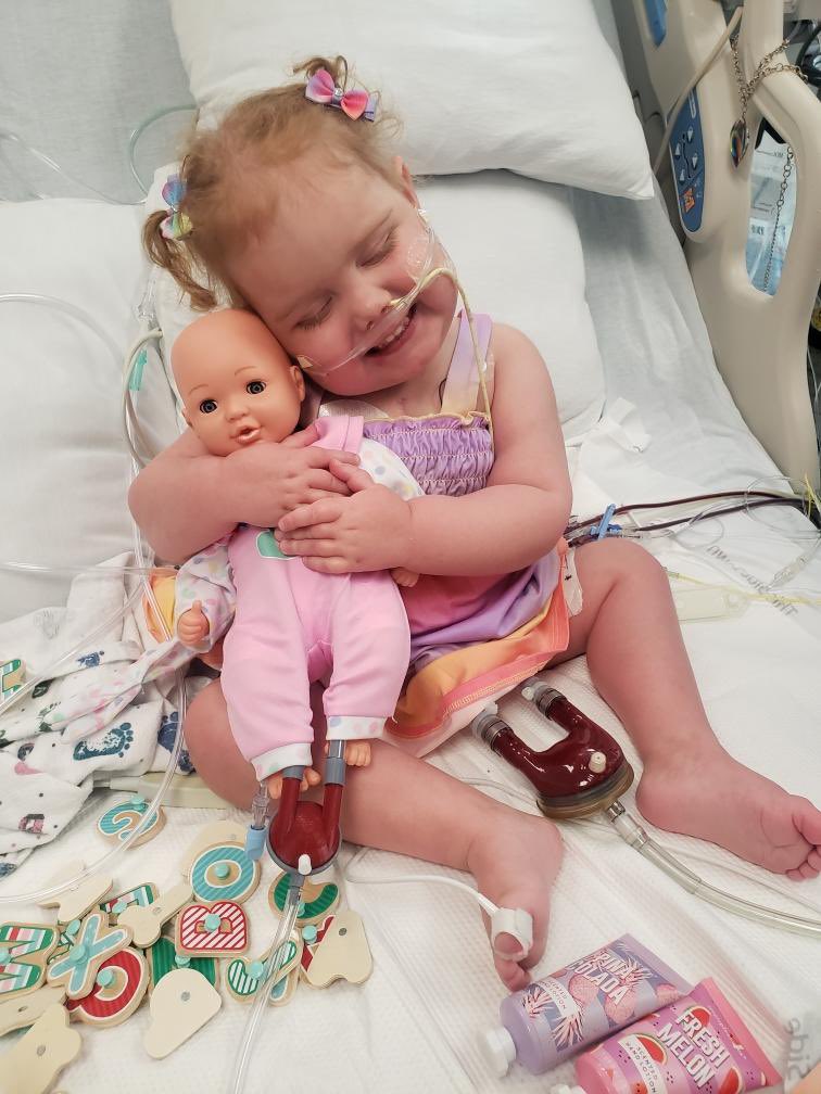 StephGoldMD's tweet photo. Representation matters! This little beauty has a doll with a VAD just like her, thanks to some magic 3D printing from her dad. @UofUpedsICU #playtherapy #PedsCICU 

(Permission to share given by parent) https://t.co/HCHgv17ABw