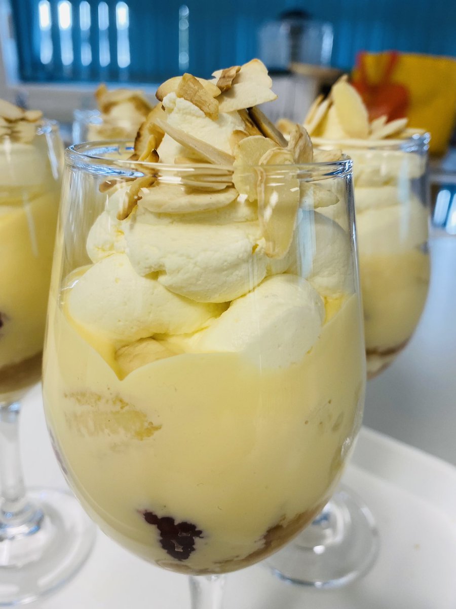 NovaCooks's tweet photo. #Trifle Live Modelling with Y10. High level skills. Base is hand made #SwissRoll, fresh, decadent double cream #custard #StrawberryJelly #bananas #raspberries #OrangeJuice #ToastedAlmonds - we are bang on trend with #PlatinumPudding https://t.co/Y7fG4zJMio
