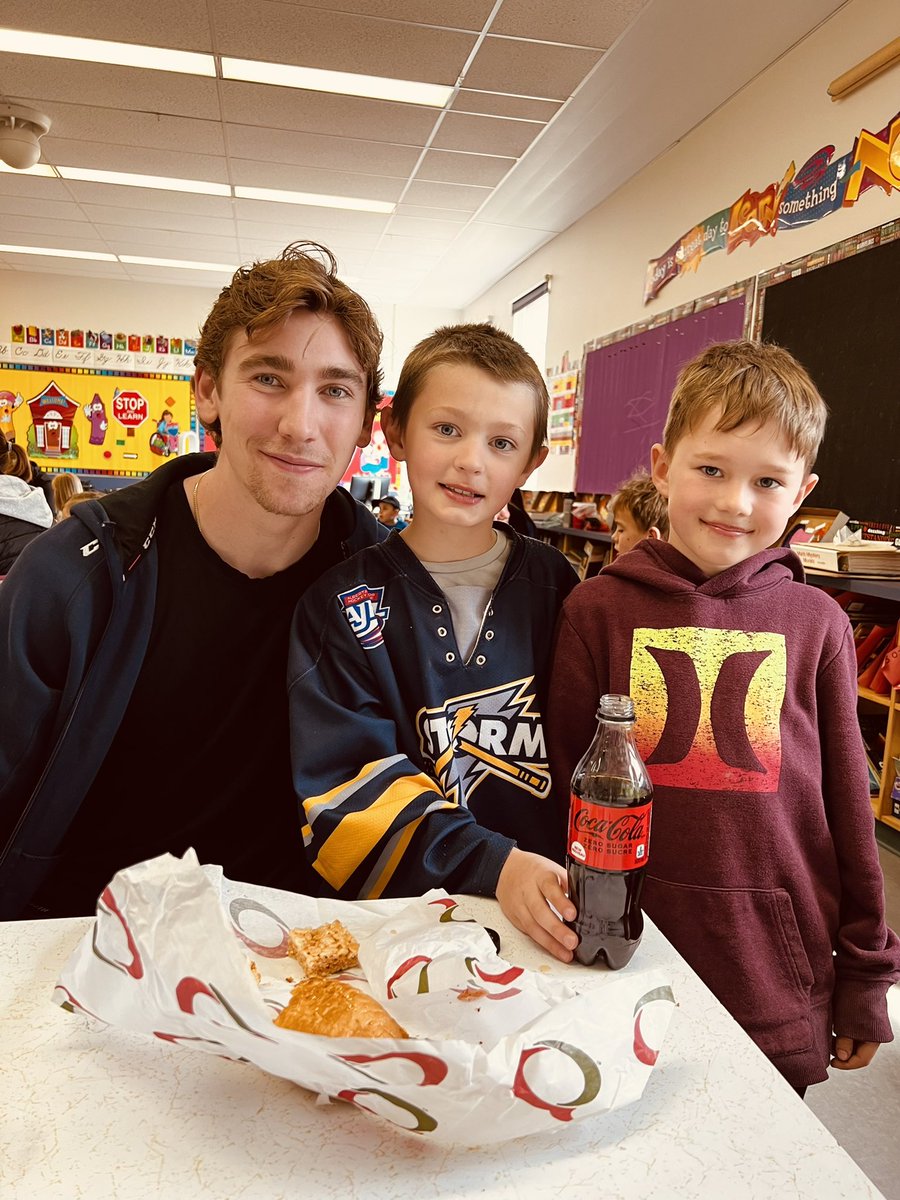 cbontoe's tweet photo. Ty Toews#9 at “Bring a Buddy” for lunch, at Beaverlodge Elementary School today, was invited by his biggest fan Brett Wallan. N Brett’s cousin joined in on the fun. Thanks parents Kori n Cas for supporting The GP Storm. 🤗 https://t.co/mQJVorXfba