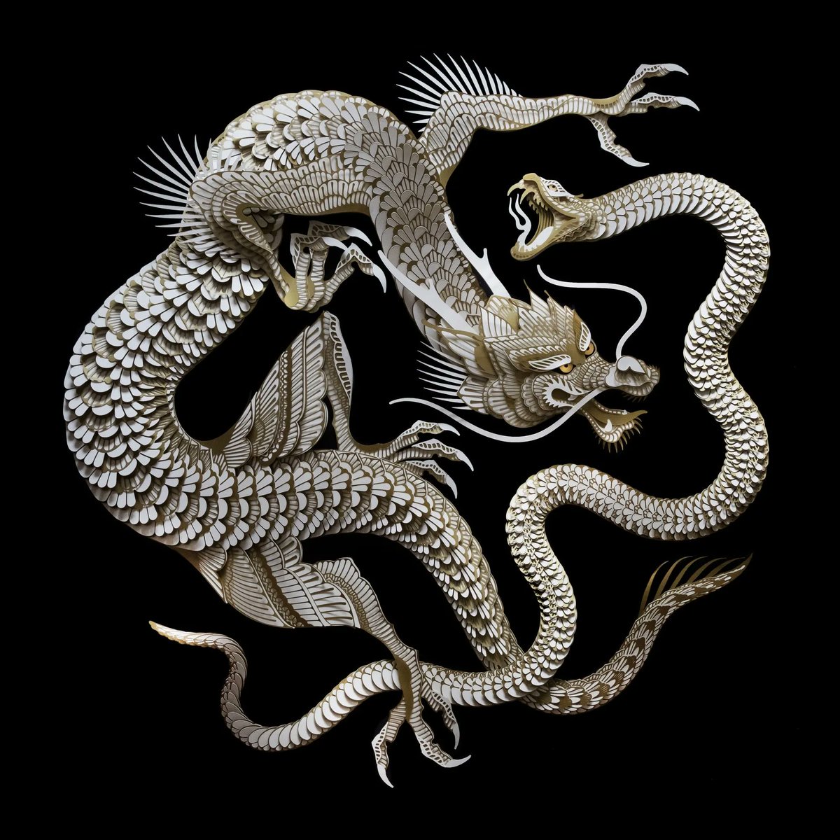 Decorative Papercuts in White and Gold Compose Patrick Cabral’s Meticulously Layered Sculptures bit.ly/3vLGjm0 from <a href="/colossal/">Colossal Biosciences®</a>