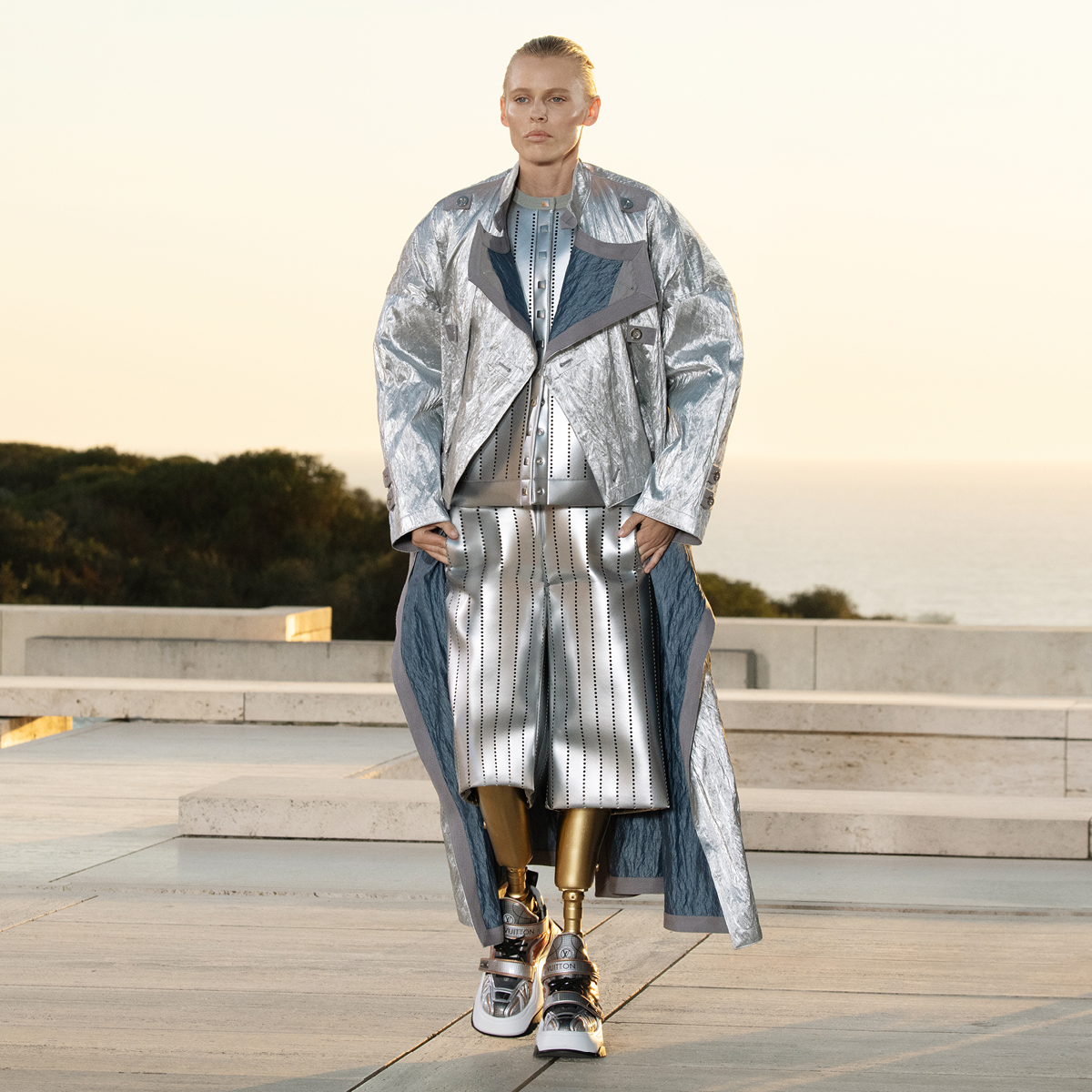 Louis Vuitton on X: #LVCruise All-over shine. @laurenwasser wears an  iridescent look from @TWNGhesquiere's latest #LouisVuitton collection with  the newly redesigned LV Archlight 2.0 sneakers. See more from the show  presented at