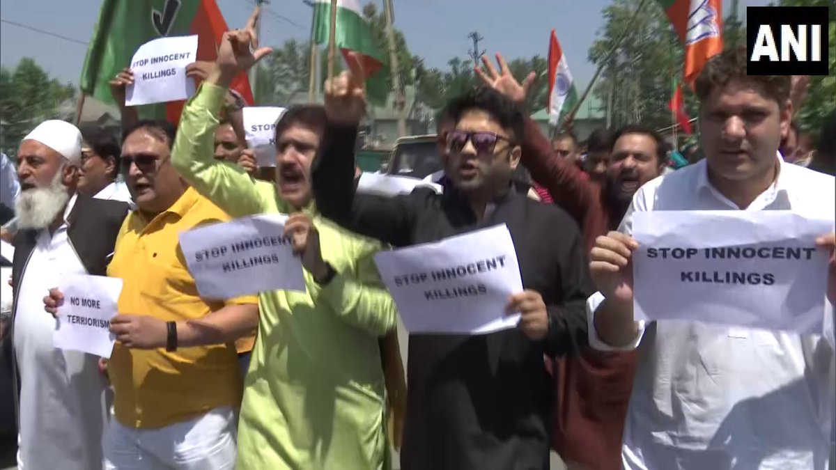 ANI's tweet photo. Srinagar J&K | BJP holds protest against the killing of Chadoora Tehsil Office employee Rahul Bhat. He was shot dead by terrorists on May 12 in his office. https://t.co/3u2pZ3NsEW
