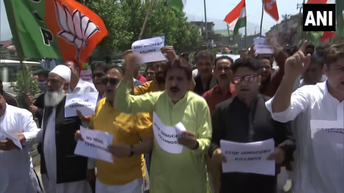 ANI's tweet photo. Srinagar J&K | BJP holds protest against the killing of Chadoora Tehsil Office employee Rahul Bhat. He was shot dead by terrorists on May 12 in his office. https://t.co/3u2pZ3NsEW