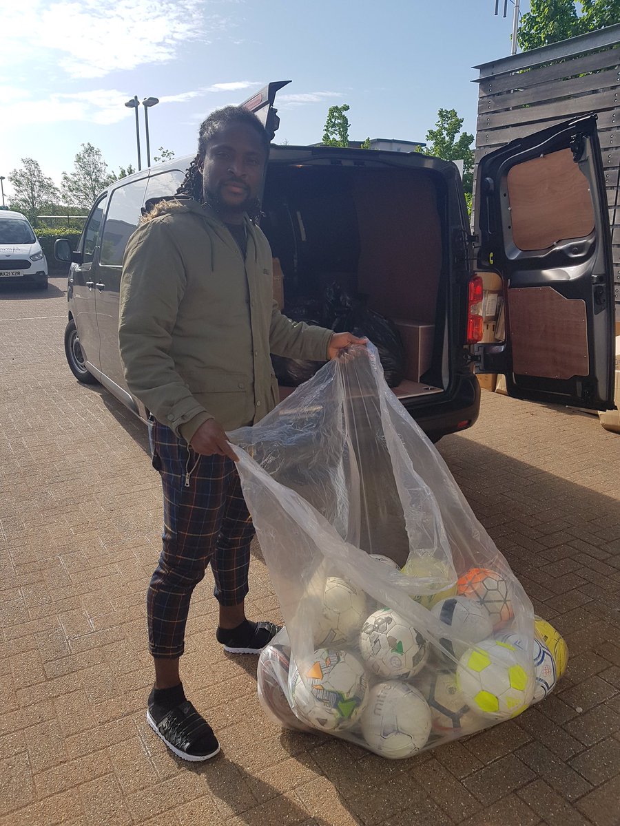 KitAid's tweet photo. A sunny outdoor kit handover session with footballs from @DAOSPEDept heading to #Ghana and #BuntingfordCougarsFC kit off to #Kenya
125 boxes and bags in total destined for #Africa https://t.co/kaqPqUm7d7