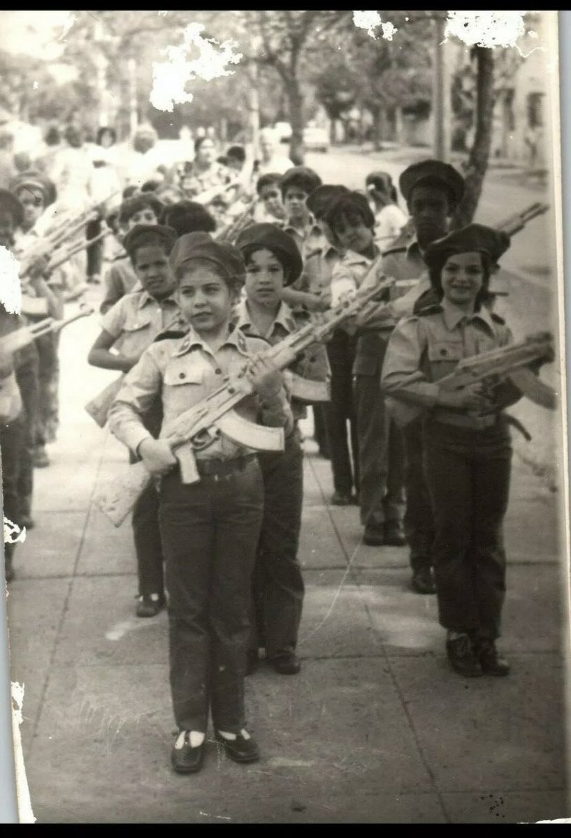 asierramadero's tweet photo. Cuban children carrying prop guns as part of their indoctrination process. Photo by Korda, 1960s. https://t.co/sihLU53QHu