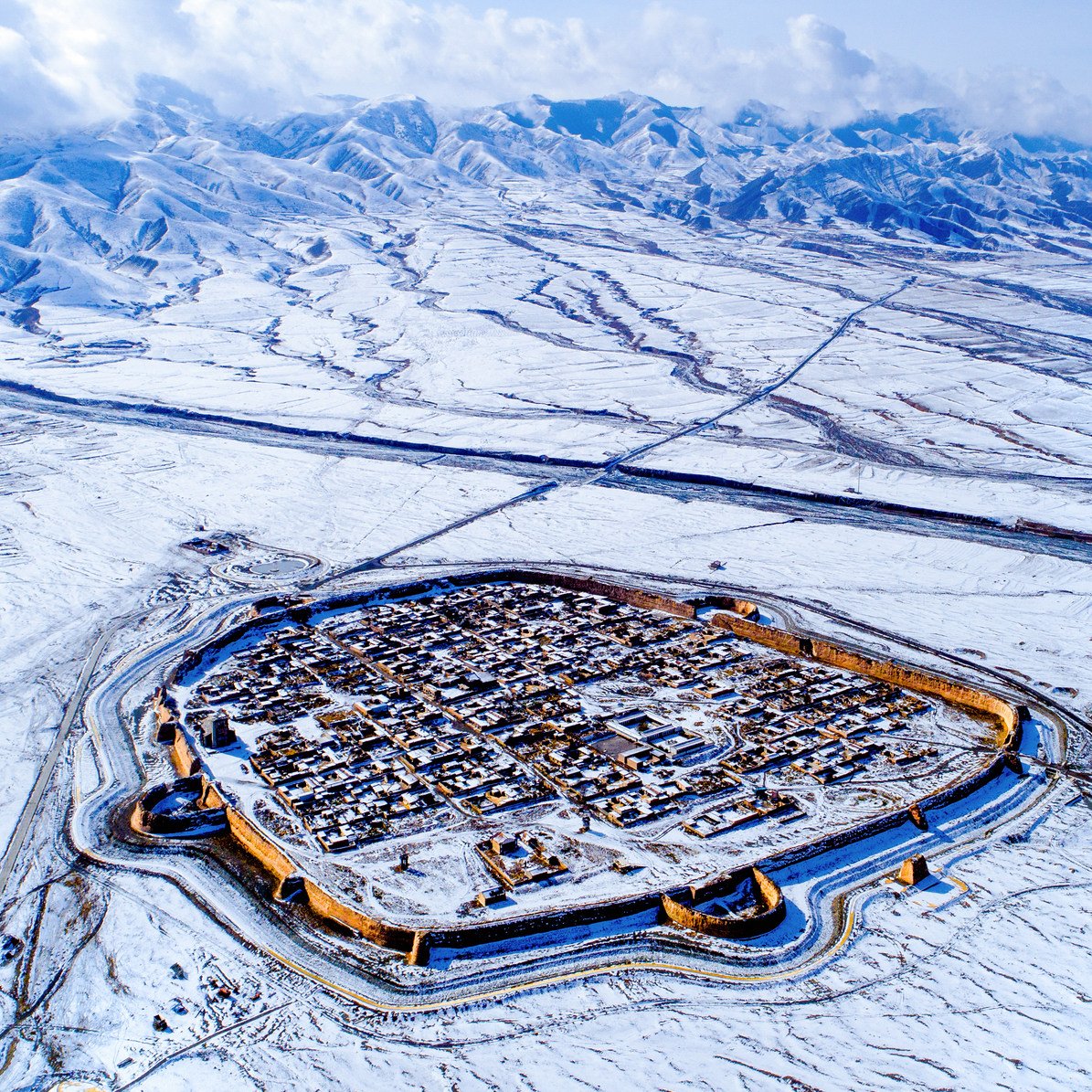 On the plateau, an ancient city in the snow.