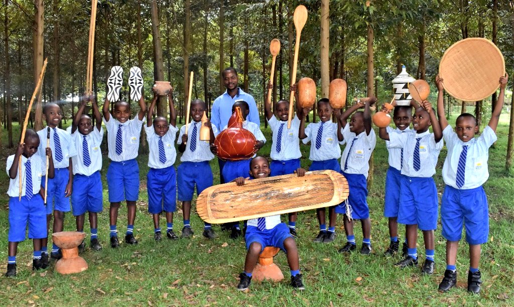 RCCS_GSF's tweet photo. Culture is one of the most important #weapons in the life of a country and its Citizens.
These kids are happy with their teacher just after explaining them #traditionaltools of #RwananCulture. https://t.co/deTFsaUYJT