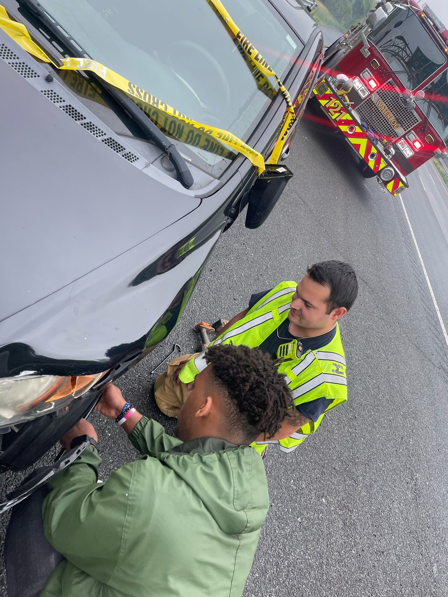 HCDFRS's tweet photo. This morning, the crew on Engine 121 taught a teenager how to change a tire, allowing him to safely move his vehicle after an accident. https://t.co/jQRAohcdnU