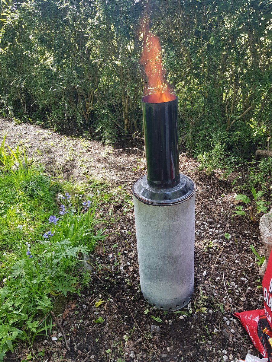 shanemuk's tweet photo. Experimental run of #TLUD gasifier, running on home-grown renewable willow clippings. Incredible heat output; flame a bit red, suggesting needs more secondary air... #fineTuning https://t.co/nuenuLlANU