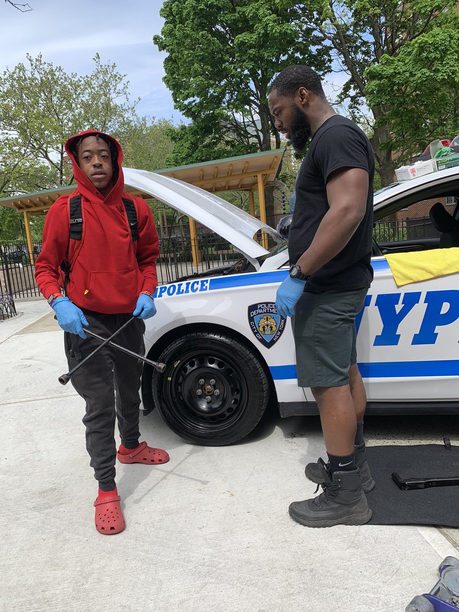 Happening now: My officers,<a href="/NYPDSchools/">NYPD School Safety</a>,community ambassador King &amp; <a href="/NYCSanitation/">NYC Sanitation</a> out and about mentoring and teaching our young men basic automotive life skills at MS72. <a href="/NYPDCommAffairs/">NYPD Community Affairs</a> <a href="/NYPDSpecialops/">NYPD Special Ops</a> <a href="/NYPD107Pct/">NYPD 107th Precinct</a> <a href="/NYPD102Pct/">NYPD 102nd Precinct</a>