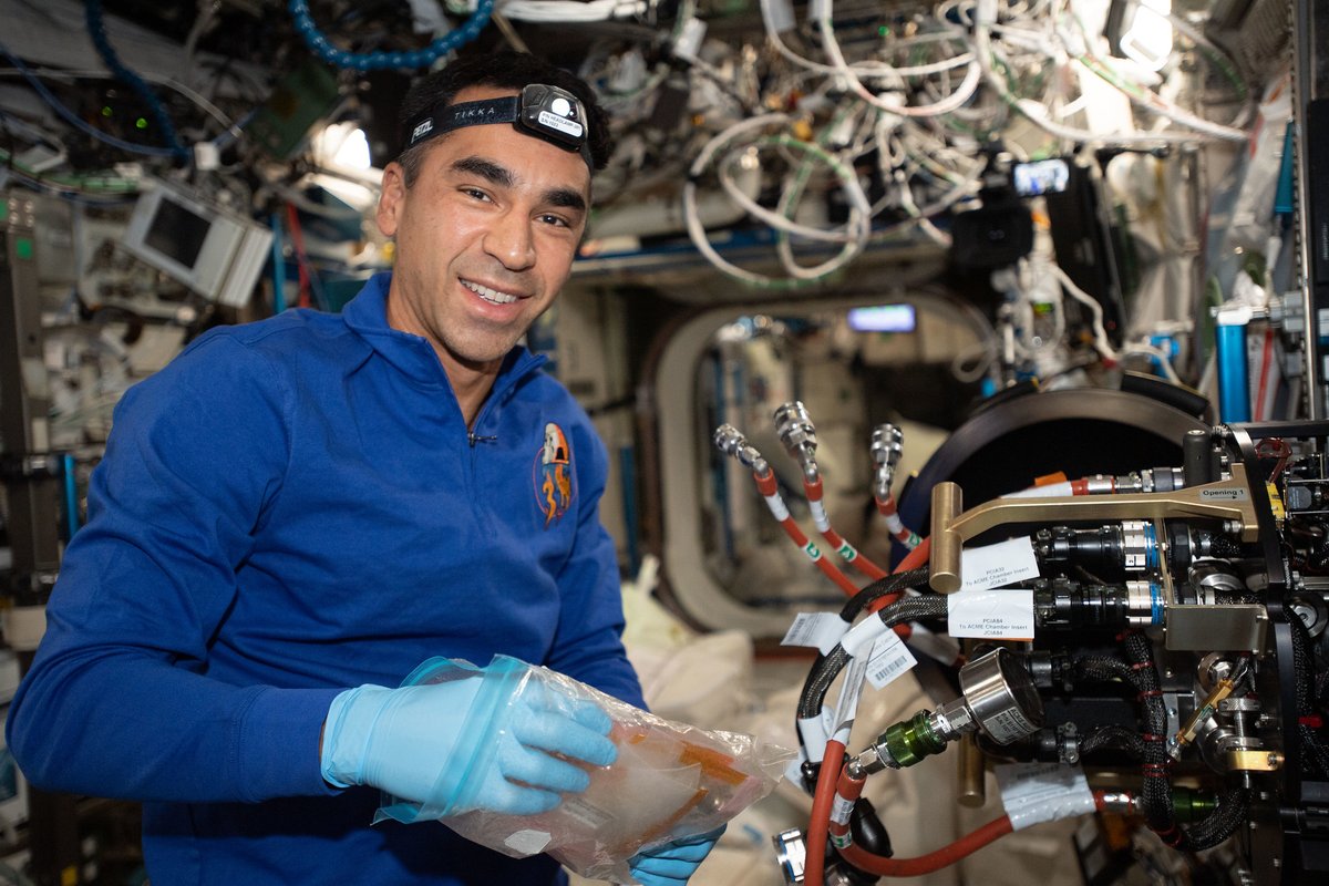 iss066e114415 (Jan. 6, 2022) --- NASA astronaut and Expedition 66 Flight Engineer Raja Chari replaces hardware inside the Combustion Integrated Rack that supports the ACME (Advanced Combustion via Microgravity Experiments) study. ACME is a series of six independent studies of gaseous flames seeking to improve fuel efficiency, reduce pollution, and promote spacecraft fire prevention.