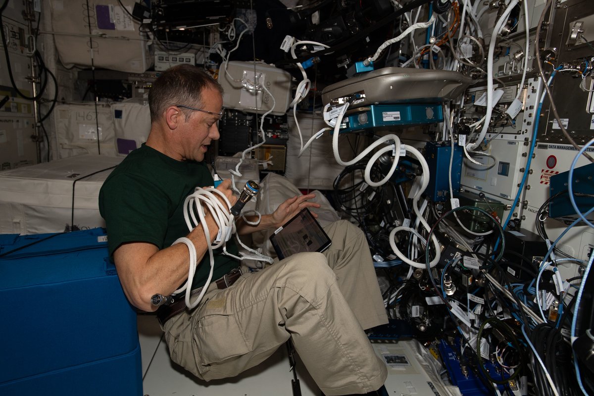 iss066e086655 (Dec. 6, 2021) --- NASA astronaut and Expedition 66 Flight Engineer Thomas Marshburn sets up hardware for the Vascular Echo human research study that examines the cardiovascular changes that take place in microgravity.
