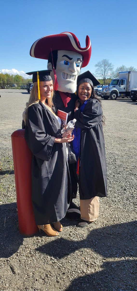 Sam with UMass graduates