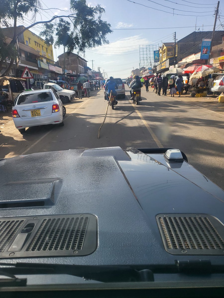 ahmednasirlaw's tweet photo. Seen a motorbike with a pole as trailer?...you have to keep your distance... https://t.co/7xfQOYZRsp