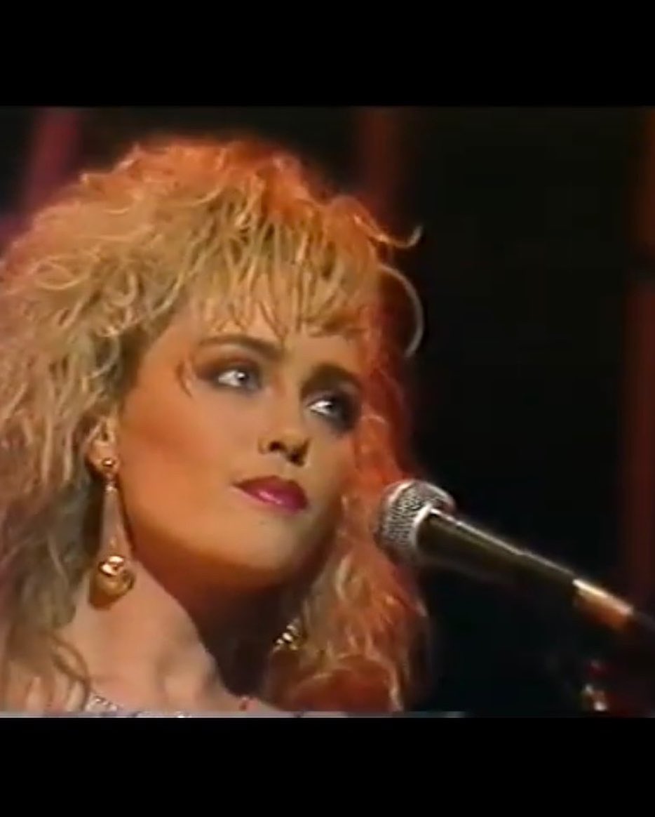 angelineball's tweet photo. Since it’s ‘cool’ now to be associated with the #EurovisionSongContest 
Here’s the late great #LiamRiley of #bagatelle battling our song out for a place in 1988.When dreams were big and hair was even bigger!🥴💖 https://t.co/8122MN2uAy