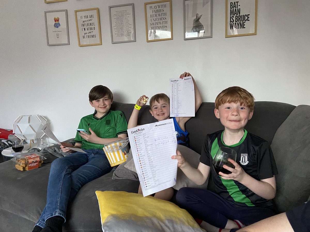 Beckypops83's tweet photo. @bbceurovision @grahnort The boys (Will, Wills &amp; Sam) are enjoying snacks, scoresheets and Eurovision magic! Mummy and daddy are enjoying the beers, scoresheets and Eurovision magic 🤣 https://t.co/Q5lyeQyHlk