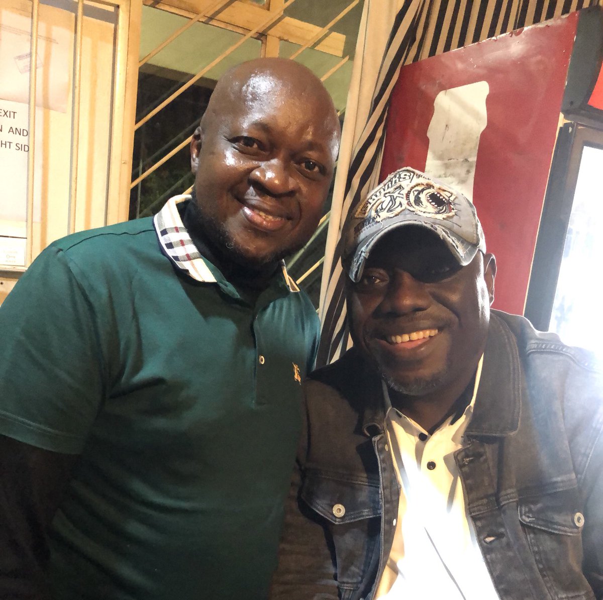 Chakariboy's tweet photo. With the president of Real Estate Institute of Zimbabwe Mr Brian Kashoni me of the most passionate fans of ⁦@LFC⁩ he is happy his team won the FA Cup, the Reds will never walk alone and it hurts ⁦@LivEchoLFC⁩ ⁦@LivEchonews⁩ https://t.co/5DKDGLgwYK