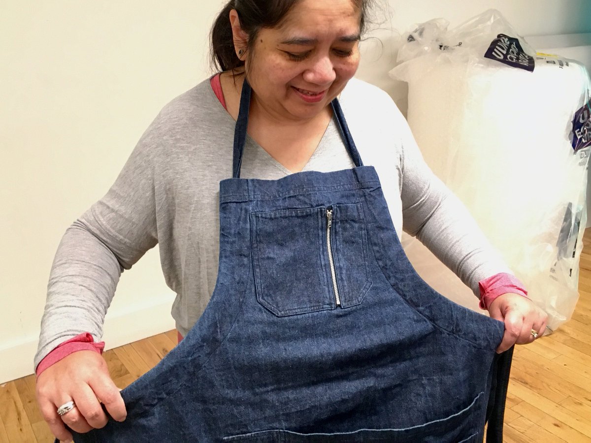 dgdesignlabs's tweet photo. "Is it a pinafore or an apron? There's lots of different sized #pockets and they're different depths. I really like the adjustable straps and the fact that it can fit a short, short body." feedback on the initial #apron concepts being shown @Gladstone_To #Art Studio #makers https://t.co/LA8pmRA3r7