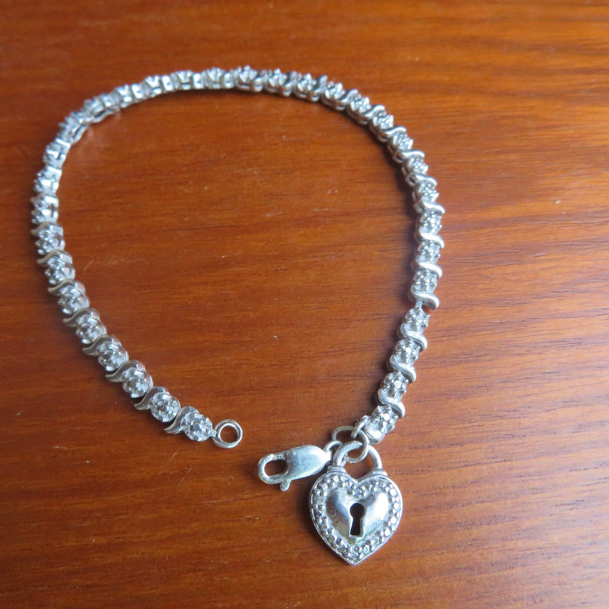 sobertj's tweet photo. Excited to share the latest addition to my #etsy shop: Genuine Diamond Accented 925 Heart Tennis Bracelet, Hallmarked 925, 7.5". Wt. 9.1G https://t.co/oecyXGplxd #silver #specialtychains #no #women #yes #lobsterclaw #artnouveau #diamond #excellentcondition https://t.co/ofwqY6G1OR