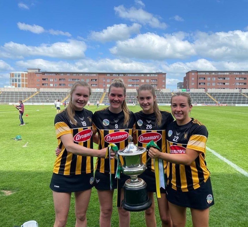 DicksboroGAA's tweet photo. Congrats to Brian Dowling &amp; his @KilkennyCamogie team on their @LeinsterCamogie Senior Championship win today. 4 Boro girls were involved in todays win. Asha Mchardy, Niamh Phelan, Ciara Phelan &amp; Kilkenny team captain Aoife Prendergast who lifted the cup. 
Well done girls⚫️🟡🇶🇦👍 https://t.co/fjGXOMsSHI