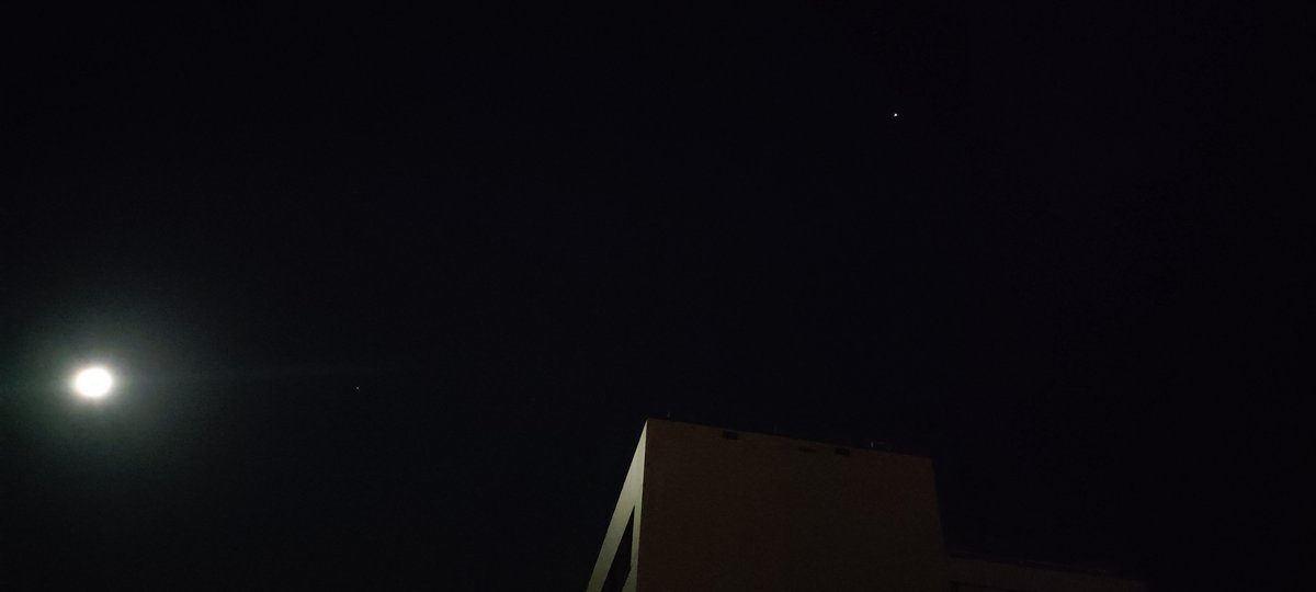 beebopalula2's tweet photo. The sky above Vienna, Austria. To the left the #moon and to the right the #ISS very bright tonight! #NASA #Space https://t.co/YG6JCWylbO