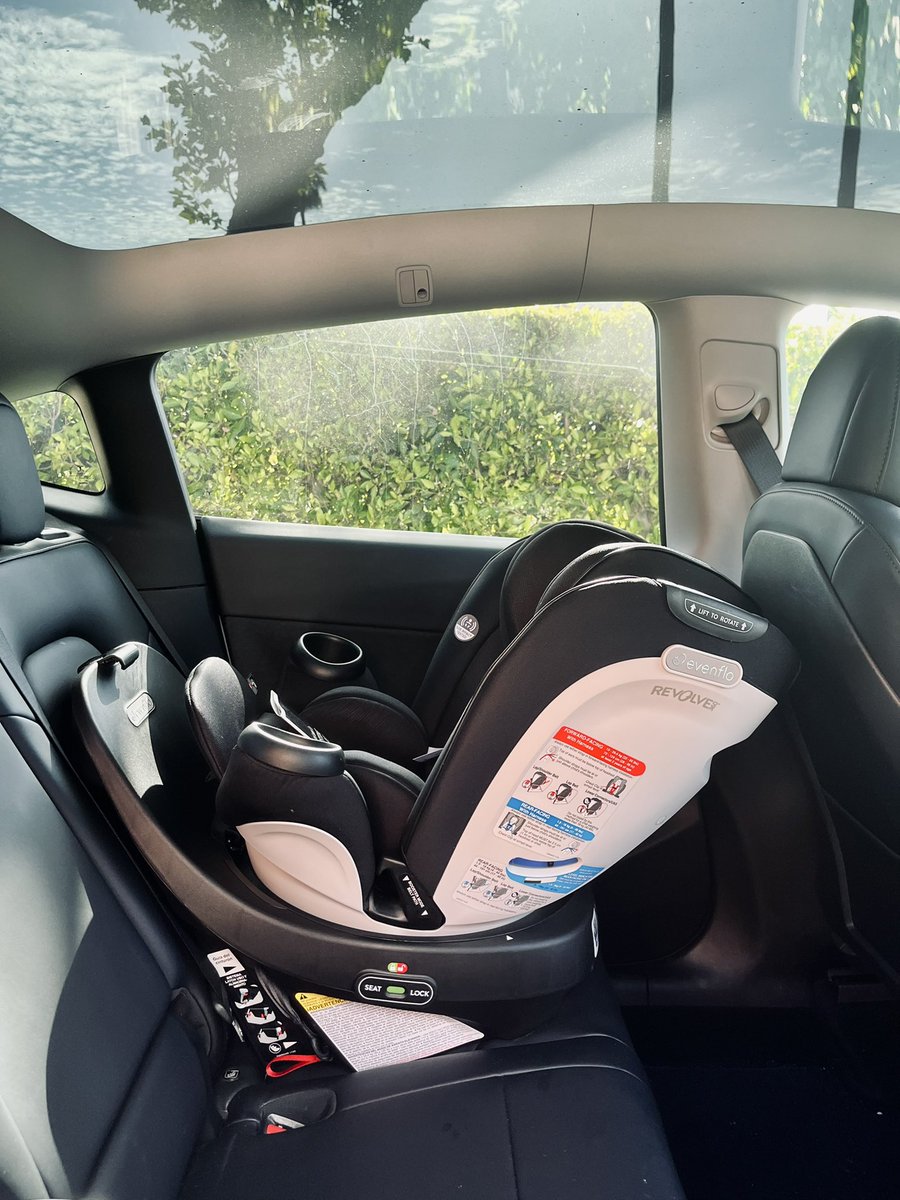 stephmarker's tweet photo. @elonmusk can you make a modern @Tesla car seat please? It’s a shame to put one of these clunky monstrosities in our sleek Model Y. https://t.co/LkY3DGzSpQ