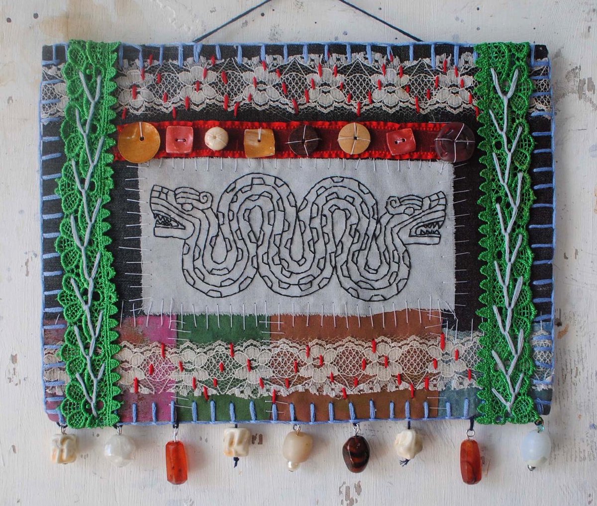 JoannaHartist's tweet photo. “Two Headed Dragon” -13.05.2022
..
#twoheadeddragon #stitchedart #mixedmediatextileart #wallhanging #embroideryart #folkart #lacestitch #aztecart #outsiderart #spiritualart https://t.co/nyl0jfcPYJ