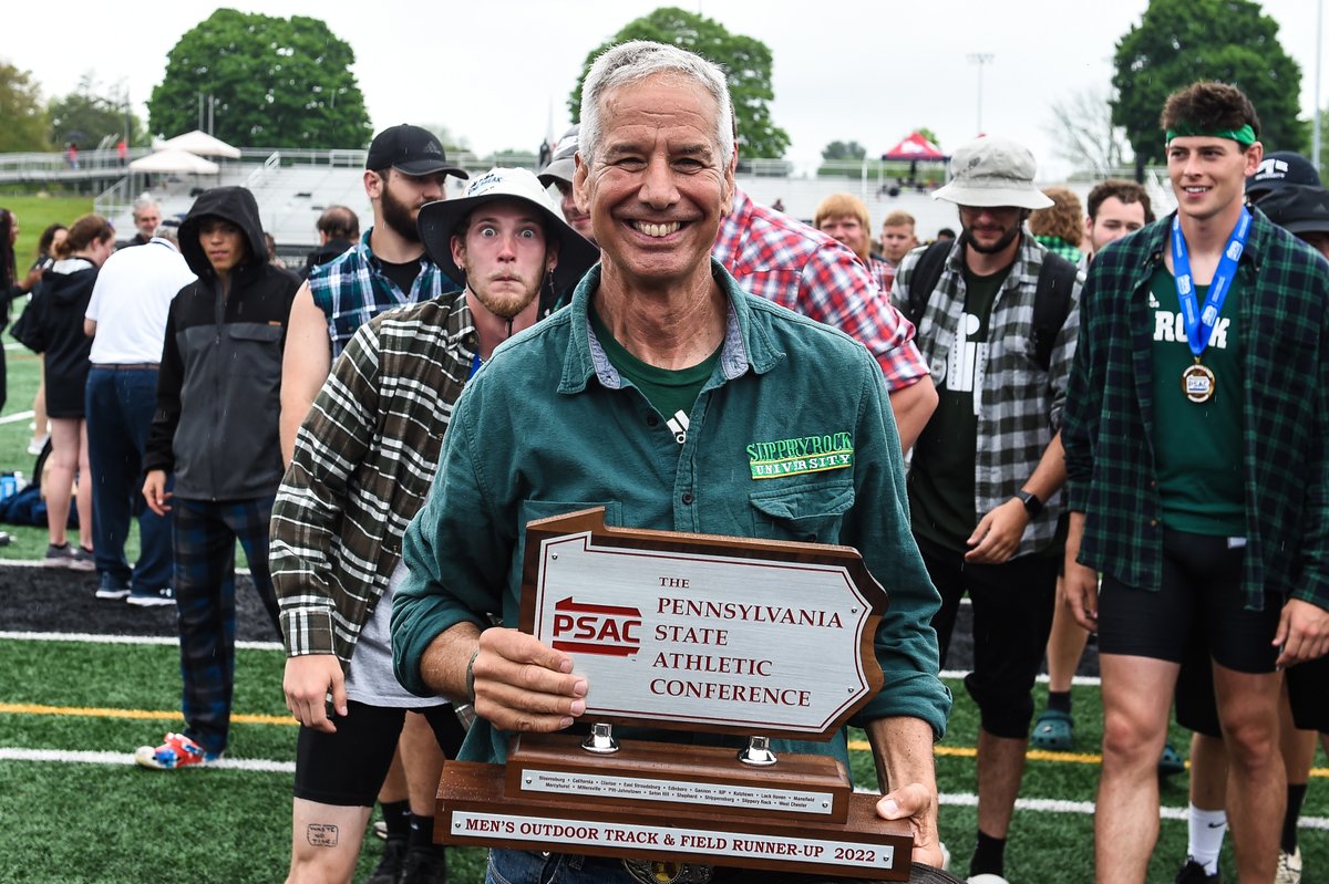 Rock_Athletics's tweet photo. TRACK: Team trophies number 56 and 57 in the legendary career of Slippery Rock head coach John Papa ⬇️

✅ 25 PSAC titles
✅ 32 PSAC runner-up finishes
✅ 345 PSAC individual/relay titles
✅ 35 years as SRU head coach
✅ A legacy of excellence, trophies and laughs https://t.co/qldlfFua2E