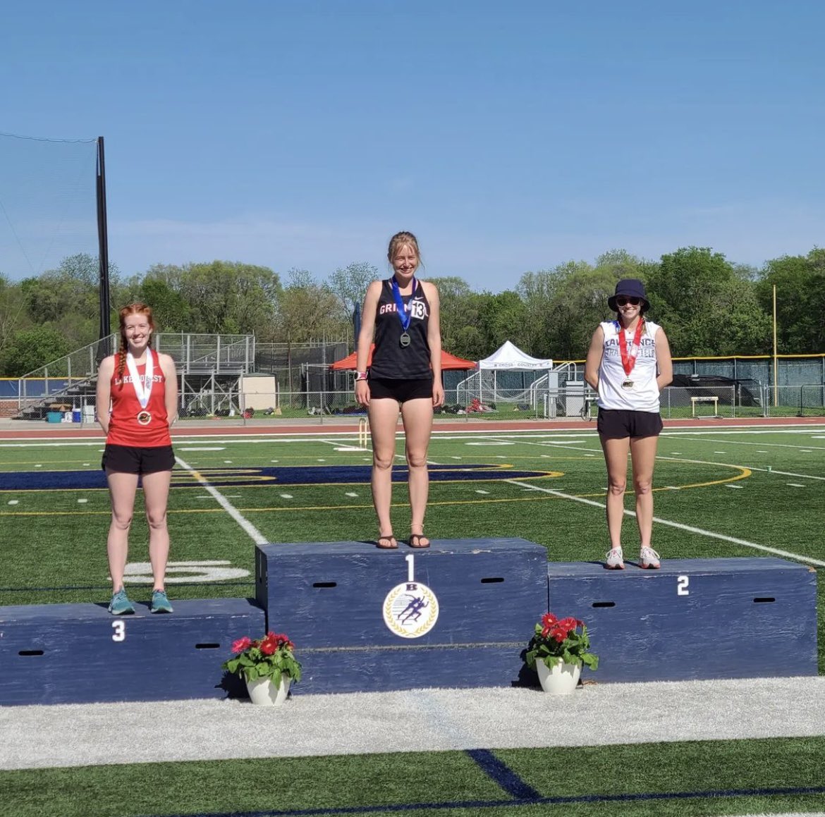 LawrenceXCTrack's tweet photo. Podium shot of the women's 5000m: Cristyn Oliver finished 2nd place in 18:24 to earn All-Conference honors!

That is Cristyn's 9th All-Conference honor of her career! #govikes #allconf https://t.co/4v7PwaOHmQ